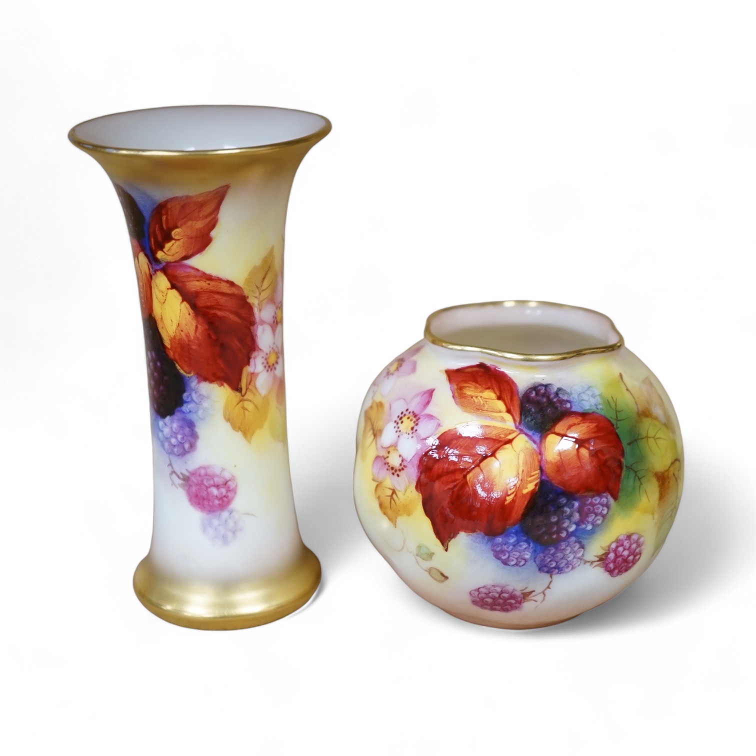 A Royal Worcester spill vase fruit painted with berries by Kitty Blake and a small bowl by the same artist, largest 11.5cm high. Condition - good